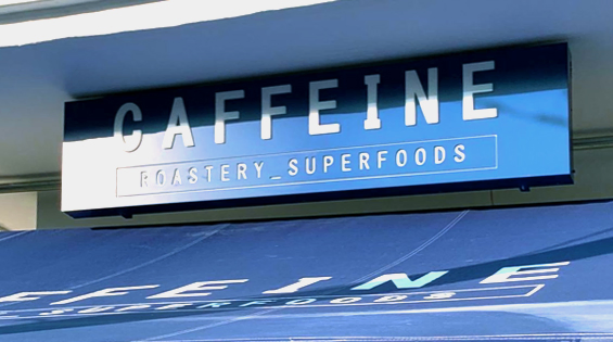 Caffeine roastery επιγραφή σόκορο κουτί